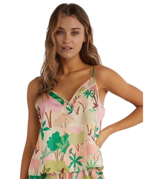 Dare to be bold with this gorgeous Alija Horvat collection from Playful Promises this season. This gorgeous cami top boasts an adorable, modern abstract print for that on-trend edge you have been looking for. This piece falls to a plunging neckline to showcase and highlight your decolletage whilst the adjustable shoulder straps allow you to tailor the fit to your own desires. This cami top is perfect for catching up on beauty sleep with the relaxed, breathable fit. Pair this cute cami top with the available matching items within Playful Promises Alija Horvat line to complete this stunning pyjama set.

Relaxed fit
Plunging neckline
Adjustable shoulder straps
Piping detailing
Abstract print
Matching coordinates available
Country of origin: China
Composition: Main: 43% Recycled Polyester | 57% Polyester
Listed in UK sizes
 Camisole Top
