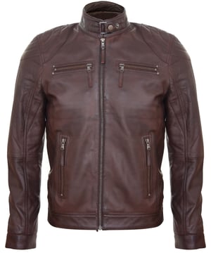 Sumptuously soft lambskin is paired with classic biker style for a stylish day wear piece. This sleek garment personifies the rugged appeal of the motorbike jacket with a YKK zip front that runs up to a stand collar and zipped cuffs to help accommodate the use of gloves. Along the side panels you will find detailed paneling to help add further character and style to the garment. For added practicality the jacket features 4 external pockets. This biker jacket exudes style and is more than an essential fashion accessory for every male.