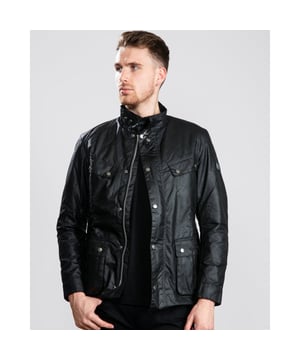 A mainstay of the World Tour collection, the Duke is a re-work of the iconic Enfield jacket in a winter-ready waxed cotton.
With biker styling and a robust construction, the Duke is crafted in Barbour&rsquo;s 6oz Thornproof wax for durable protection with a lustrous finish, complete with a two-way zip and hardy studded storm fly front. A quilted nylon lining adds warmth, while the cosy funnel collar and stud-fastening cuffs boast a contrast corduroy lining for incredible softness and a signature Barbour look.
Paying homage to Barbour&rsquo;s motorcycle heritage, authentic detailing includes elbow patches, four studded pockets and a collar strap. The lower bellow pockets feature a stylish pleat and are generously proportioned to carry essentials without adding bulk, while a zipped inner pocket safeguards valuables. Available in four versatile colours with the Barbour International badge to the sleeve, the Duke is subtly tailored with a relaxed fit ideal for winter layering.

Back length: 28.5–32" | 71.5–81.5cm
Mediumweight 6oz Thornproof wax outer
Sponge clean only