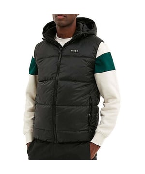 Elevate your layering game with the Nicce Expo Men's Black Gilet. Designed for versatility and style, this gilet is perfect for adding extra warmth without the bulk, making it an ideal choice for transitional weather or layering over your favorite outfits.
 
Key Features:
Lightweight Padding: 

Offers effective insulation and warmth without adding bulk, making it a comfortable choice for layering over t-shirts, hoodies, or sweaters.

Durable Fabric: 

Constructed from high-quality, durable materials, the gilet’s outer shell provides protection against light wind and rain, ensuring long-lasting wear.

Sleek Black Design: 

The classic black color and minimalistic design give this gilet a contemporary look that effortlessly complements casual and smart-casual outfits.

Full-Zip Front Closure: 

Features a full-length zip for easy wear and removal, while allowing you to adjust ventilation and fit according to your comfort.

High Neck Collar: 

Designed with a high neck collar to provide extra coverage and warmth, offering protection against cooler winds and adding a stylish touch.

Zipped Pockets: 

Equipped with two front zipped pockets that provide secure storage for your essentials, like phone, keys, or wallet, while keeping your hands warm.

Elasticated Armholes and Hem: 

The elasticated armholes and hem ensure a snug fit, helping to retain heat and provide additional comfort.

Nicce Branding: 

Features subtle Nicce branding on the chest, adding a touch of refinement and making it a recognizable piece from the stylish streetwear brand.

Versatile Layering Piece: 

Perfect for wearing over long-sleeve shirts, hoodies, or sweaters, this gilet adds a modern edge to any outfit, making it a great option for casual outings or light outdoor activities.

 
Whether you’re looking to add a stylish layer to your look or need an additional piece for outdoor warmth, the Nicce Expo Men's Black Gilet combines practicality with a sleek aesthetic, making it a go-to addition to your wardrobe.