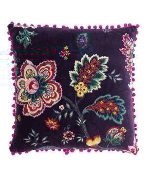 The Paoletti Palampur cushion cover features a detailed Indian-inspired flower print in bright, vibrant colours on sumptuously soft faux velvet. Contrasting pompom edges adorn the border of this wonderful cushion adding a touch of extra quirkiness. Complete with knife edging and a hidden zip closure to keep your cushion pad firmly in place. Made using 100% high-quality cotton this cushion is super soft and snuggly. To keep this cushion looking as good as the day you first bought it machine wash at 30 degrees. Use a warm iron and tumble dry on a low setting for the best results.