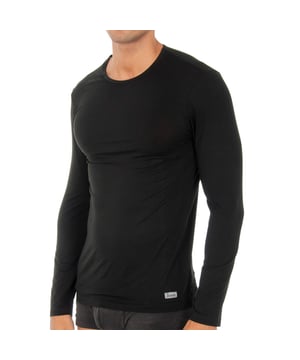 Camiseta Innovación.
Manga larga.
Cuello redondo.
Algodón Termal Tech, que genera y retiene el calor corporal.
Tejido liso, muy suave y cómodo.
Prenda que se ajusta perfectamente al cuerpo.
Etiqueta de tela con el nombre de la marca, en el lateral inferior.
Costuras vistas a tono.
 Composición: 40% Acrílico, 34% Poliéster, 21% Viscosa, 5% Elastano
 Cuidados:
Lavar a mano a temperatura máx. 40º.
No utilizar lejía.
No permite el uso de secadora.
Planchar a temperatura máx. 130º.
No lavar en seco.
