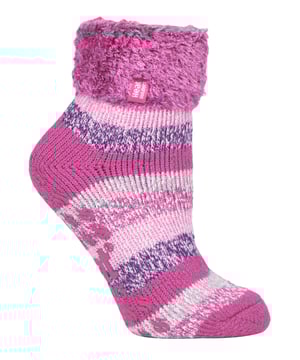 Lounge around the home in these cosy socks. Whether you're looking to stay warm or comfortable indoors, these lounge socks feature a cute and stylish design so you can pair them with any casual outfit! Every Heat Holders® sock, including these lounge socks, are created by UK PATENTED knitting technology. This unique manufacturing process together with Heat Holders® innovative Japanese designed thermal yarn ensures maximum warmth is held close to the skin, keeping your feet warmer for longer. With a strong TOG rating of 2.34, these socks are designed to keep your feet warm as well as retain heat close to the skin. They also prevent your feet from feeling clammy with their soft brushed inner thermal lining. With long pile cushioning, these thermal socks will help keep feet fully comfortable and supported. Heat Holders are made from a specially developed heavy bulk yarn which has extreme thermal-like qualities. These socks would make the perfect gift for any woman who suffers cold feet! Choose from our different colours and styles to suit your woman's fashionable needs! Why not treat yourself to these lovely pair of cosy socks to wear in bed? Featuring a turn over cuff, you can pull up or roll down these socks for a much more comfortable fit! These socks also have a low cut ankle length so you can subtly show off your socks! Stop sliding or slipping on wooden or tiled floors with these non-slip gripped socks. They feature a rubber-like non-slip grip so you can walk around the home comfortably. These socks are available in womens sizes 4-8 UK