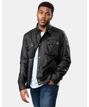 The Racemaster jacket in Faded Olive. There’s more to the Racemaster than meets the eye. Introduced back in 1981, it was originally billed as a shorter version of the iconic Trialmaster. This means that, along with the history, heritage, and dark navy 6 oz. waxed cotton, you also get increased mobility and freedom to move.

6 oz. waxed cotton, with a unique blend of micro and technical waxes
Four external pocket field jacket with reinforcement patches and corduroy details
Water-repellent and wind-repellent
Corduroy linings at the collar, cuffs and hem providing added comfort and resilience at high contact points
Signature antique brass metal hardware with Belstaff England engraved on the round and signature phoenix woven patch on left sleeve
Centre front zip closure with snap closure placket
Buckle-adjusted collar
Two press-stud flap pockets
Two lower zipped pockets
Left internal pocket

Shell: 100% Cotton, Body Lining: 100% CottonSleeve Lining: 55% Polyester, 45% Viscose/Rayon105306
