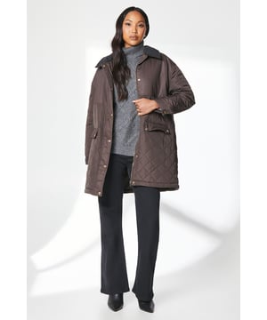 Quilted design for added warmth and texture
        Contrast corduroy collar for a stylish accent
        Roomy patch pockets for practicality
        Button-through front closure for easy wear
        Mid-thigh length offering versatile coverage
    
    This Principles quilted jacket combines practicality with effortless style, making it a versatile addition to your autumn and winter wardrobe. The contrast corduroy collar adds a touch of sophistication, while the quilted design ensures you stay cosy on chilly days. Perfect for casual outings, this jacket can be styled with a variety of looks. Layer it over a chunky knit jumper and pair with your favourite jeans and ankle boots for a classic weekend ensemble. For a smarter appearance, wear it over a crisp white shirt, tailored trousers, and loafers. The mid-thigh length provides ample coverage, making it ideal for those in-between seasons when the weather can be unpredictable. Whether you're heading to a family gathering or running errands in town, this jacket will keep you looking chic and feeling comfortable all day long.