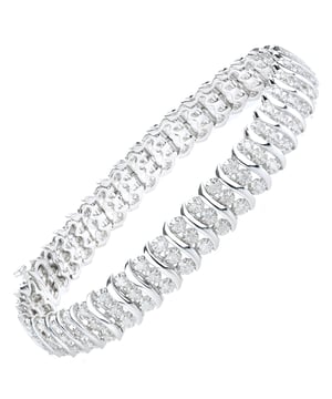 9K (375) geel goud: 7 gram; # Diamant: 1,5 ct