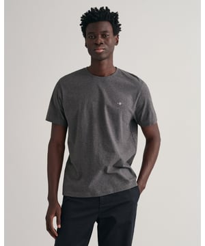 This T-shirt with a small embroidered shield motif on the chest is made of cotton and has a fine rib at the neckline for ultimate comfort. It's an essential part of any ensemble, wear it under your favorite knitwear, outerwear or teamed with jeans, chinos and shorts alike.
Regular fit Round neckline Embroidered GANT graphic on the chest
&nbsp;
2003184
&nbsp;