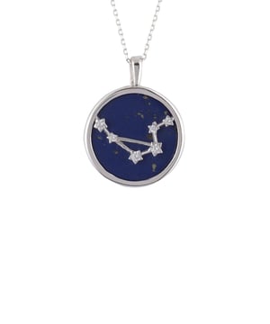 Are you looking for the perfect way to show off your star sign? Look no further than the Zodiac Lapis Lazuli Gemstone Star Constellation Pendant Necklace! Made of beautiful lapis lazuli and 925 sterling silver, this necklace is guaranteed to turn heads. The beauty of lapis, as wondrous as the night sky, provides the perfect backdrop for a sparkling star constellation pendant. The back of the pendant features cut-out stars with lapis lazuli showcasing through and an engraving of your own star sign name!Libras, born between September 23 and October 22, are known for their balanced approach to life. They strive for harmony and justice in all aspects of their lives and rarely take sides during a conflict. Libras possess an innate ability to see both sides of any situation before making a decision or taking action. This logical yet compassionate way of thinking makes them natural mediators and problem-solvers.From day to night, this stylish statement piece will add a touch of glamour and elegance to any look. As if that weren’t enough, this amazing necklace comes with a 40cm plus 5cm adjuster chain, wear it long or short and stay in style and weighs a lightweight 5.3 grams. So don’t wait – get yours today and show off your zodiac pride in style!