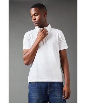 Classic regular fit polo design
        Short sleeves for warm-weather comfort
        Ribbed collar for a polished look
        Three-button placket for adjustable style
        Versatile solid colour for easy pairing
    
    This Burton regular fit polo shirt is the epitome of casual sophistication, perfect for the modern gent who values both style and comfort. Ideal for a variety of occasions, from casual Fridays at the office to weekend outings with mates, this polo effortlessly bridges the gap between relaxed and refined. The regular fit offers ample room for movement, making it a go-to choice for active days or leisurely pursuits. Style it with chinos and trainers for a smart-casual look that's spot-on for a pub lunch or family gathering. For a more laid-back vibe, pair it with your favourite jeans and a lightweight jacket. The versatility of this polo makes it a wardrobe essential, easily transitioning from daytime errands to evening catch-ups with friends. Its timeless design ensures you'll look put-together without trying too hard, embodying the effortless style that Burton is known for.