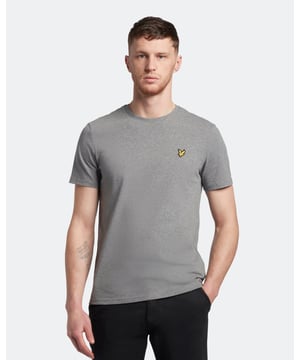 Crafted from 100% cotton from unrivalled softness, the Lyle & Scott Plain T-Shirt is an iconic style and the definition of a wardrobe staple. Featuring a classic silhouette, detail stitching at collar and cuff, plus our signature Golden Eagle, this t-shirt can be seamlessly layered or stand alone as the centrepiece of any smart-casual outfit.  
  
Fit: Regular
It is crafted to fit the body neither too tightly or too loosely, leaving you with a classic, timelessly stylish look. We recommend you order your usual size, but if you're caught between two, go a size up.