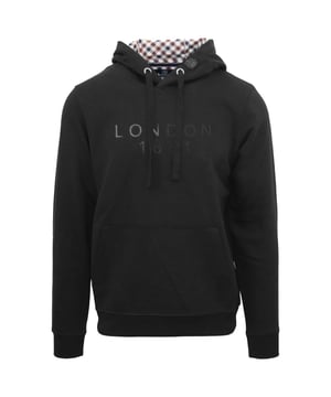 Aquascutum Bold London 1851 Logo Black Hoodie. This London Logo Black Hoodie from Aquascutum is the perfect blend of fashionable and functional. It's made of a lightweight, breathable fabric and has a stylish logo detail that elevates any casual look. Stay warm and stylish today with Aquascutum!. Elasticated Sleeve Ends and Waist, Drawstring Hood. 100% Cotton Hooded Jumper, Large Kangaroo Pocket. Regular Fit, Fits True To Size. Style Code: FC0123 99