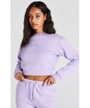 inchLilac Crop SweatshirtCropped fitSoft touchEmbroidered patchCrew neckPrinted neckbandMachine wash67% Cotton 33% Polyester inch