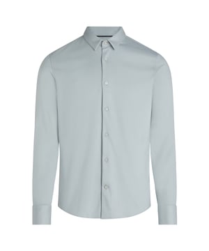 Herrenhemd der Marke Calvin Klein. Die Hemden von Calvin Klein sind aus 100% Bio-Baumwolle gefertigt und haben eine schmale Passform. Die weiche Baumwolle sorgt für hohen Tragekomfort.  Marke: Calvin KleinModellname: Smooth Cotton Slim ShirtKategorie: HerrenhemdMaterialien: Bio-BaumwolleFarbe: schiefergrau