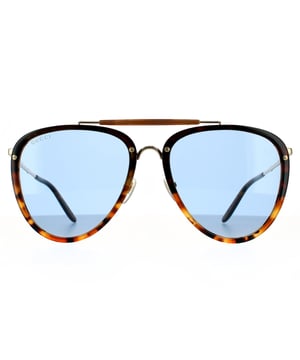 Gucci Aviator Mens Havana  Blue Sunglasses Gucci are a feminine aviator style crafted from lightweight acetate with contrasting metal details. Teardrop shaped polyamide lenses are framed in plastic, with a distinctive top bar, metal bridge and adjustable nose pads. Super slim metal temples are finished with a Gucci logo engraving.
