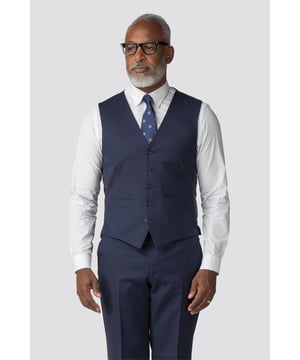 Twill Performance Waistcoat by Racing Green. Part of our Racing Green Performance range, this regular fit suit is built for comfort and durability. The fabric is specially coated with Nanotex to make it spill resistant, meaning you can look great and stay comfortable all day long. Pair this with a coordinating Racing Green shirt and tie.