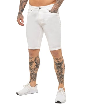Kruze by Enzo Men's Skinny Fit Shorts, expertly crafted with a midrise and featuring a timeless 5 pocket design. Finished with a sleek zip fly fastening and adorned with premium branded buttons and rivets, these shorts exude sophistication and luxury.