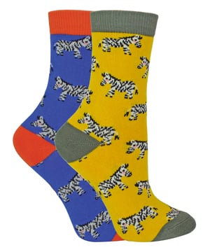 These boys' socks are so soft, they’ll never want to take them off! Mr Heron Boys 2 Pack Bamboo Animal Socks are a fun choice to add something unique to the sock collection of your little guy. These socks are made of bamboo, which makes them super soft and comfortable to wear as well as being hypoallergenic and naturally antibacterial so there's no risk of irritation or itching. Perfect for sensitive skin! Each 2 pack features cute and fun animal designs. Choose from 10 different patterns like: Zebras, Tigers, Sheep, Sausage Dogs, Pandas, Lions and more! Miss Sparrow prides their products on the philosophy of making your feet feel fabulous all year round. Whether it's their chic and stylish products, they bring you unique, exciting and fashionable accessories, full of individuality to give you the confidence to be you. These socks come in a 2 pair pack and are made from 52% Bamboo, 18% Polyester, 16% Cotton, 12% Polyamide, 2% Elastane. They come in 3 Kids Sizes: 2-3 Years, 4-6 Years & 7-9 Years and are Machine washable under 40. Do not dry clean. Do not iron. Do not bleach.