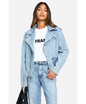 Classic biker-style denim jacket with a modern twist
        Adjustable belt detail for a customisable fit
        Asymmetrical zip closure for edgy appeal
        Notched collar and epaulettes for authentic biker look
        Functional side pockets and chest pocket for practicality
    
    Embrace your inner rebel with this contemporary take on the timeless denim jacket. The biker-inspired design combines urban edge with versatile style, making it a must-have addition to your wardrobe. Perfect for casual outings, this jacket can effortlessly transition from day to night. Pair it with high-waisted jeans and a graphic tee for a laid-back lunch date, or throw it over a floral dress to add a touch of attitude to your ensemble. The adjustable belt allows you to cinch in the waist for a more tailored silhouette or leave it loose for a relaxed vibe. Ideal for family gatherings or casual meet-ups with friends, this jacket is sure to become your go-to outerwear piece. Its durable denim construction ensures longevity, while the classic design promises to remain stylish season after season.