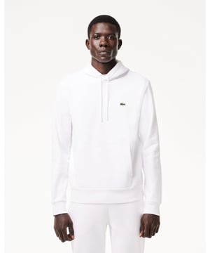 No need to compromise between style, comfort and durability. Trendy, warm, light: an essential for your crocodile wardrobe.Classic fitJersey lined hoodKangaroo pocketEmbroidered crocodile sewn onto chestBrushed organic cotton fleeceMain fabric: Cotton (84%), Polyester (16%) / Hood lining: Cotton (100%) / Rib edge: Cotton (98%), Elastane (2%)SH9623