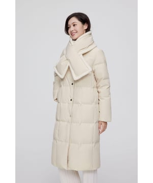 Crafted with premium 680+ quality duck down, this jacket blends elegance with sustainability. Made from eco-friendly, biodegradable fabric—an award-winning choice in sustainable fashion—it features a soft, minimalist hooded design and a detachable scarf for added versatility and warmth.

HIGH QUALITY 680+ DUCK DOWN: 90% filling for optimal warmth, evenly distributed for consistent warmth.

ECO-FRIENDLY TECH FABRIC: Made from eco-friendly SORONA fabric, derived from plants and biodegradable.