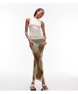 Skirts by Topshop Tall This is Topshop Floral design High rise Elasticated waistband Slim fitSold By: Asos