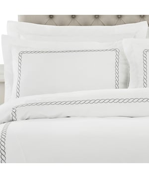 <span style="color: rgb(34, 34, 34); font-family: Arial, Helvetica, sans-serif; font-size: small;">The Cleopatra Pillowcase features a rope embroidered border on a crisp white background. Made of 100% cotton with a 200 thread count making this hotel-quality pillowcase amazingly soft. This pillowcase has an envelope closure and opulent oxford border detailing. Cleopatra is fully machine washable and suitable for ironing.</span>