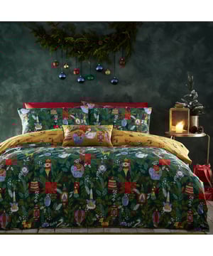 Get into the Christmas spirit with this Deck The Halls bedding. Featuring an intricate design of traditional festive trinkets on a backdrop of foliage and greenery. A scattered design of boughs of holly covers the reverse giving you two looks in one!