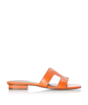 Stay smart and stylish this summer with Dune London's Loupe slider sandal. Featuring a cut out design with contrast stitching and a low block heel. An open sandal toe and resin sole complete the striking shoe.