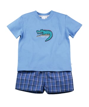 Our crocodile is guaranteed not to snap - it only smiles! Our shortie cotton pyjamas set brings some fun to bedtimes! Made from 100% super soft cotton. The soft jersey mid blue top, with the crocodile embroidery / applique has a matching rib neck, so easy to put on and off. The shorts have a fully soft elasticated waist and are made in a crisp summer cotton check.  We are sure these will be a firm favourite this summer!