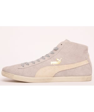<p>Originally designed as a basketball shoe, the Glyde has retained its iconic status but has been redesigned with a vintage look in a mid-design. </p> <p>This vintage edition is presented with a premium grey coloured brushed vintage suede upper and formstripe branding on the sides, sat on a vintage outsole. They also feature a padded tongue with a woven brand tab, gold Puma lettering on the side, a premium soft leather lined inner, and a spare set of laces.</p> <p>- Vintage finish suede leather upper</p> <p>- Secure lace up system</p> <p>- Puma branding throughout</p> <p>- Leather inner for added comfort</p> <p>- Eco ortholite insole</p> <p>- Durable outsole with treaded design for added grip</p>