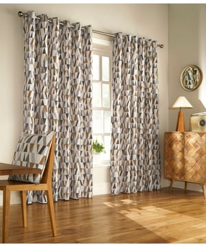 Inject some life back into your interior with these cool and contemporary curtains, that boast a design of mixed geometric shapes. Featuring a warm-toned palette this fully lined design would sit well within most décor styles – especially within Swiss and Scandi style interiors and eyelet headings.