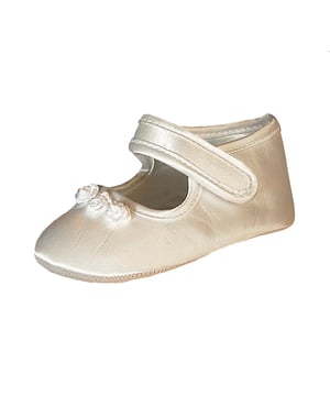 Tianna Mock Silk Shoe.  The mock silk shoe perfectly compliments our Heritage special occassion dresses and christening gowns with 3 flowers on the front and velcro fastening. 
The shoe comes in an organza keepsake bag with a gift tag. Sponge Clean Only