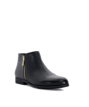 Crafted with contrasting textures and versatile enough to complement any outfit, Pandias are a staple you'll reach for throughout autumn and winter. They feature a low block heel, a classic round toe and gold-tone side zip fastenings, ensuring the perfect balance of style and comfort.