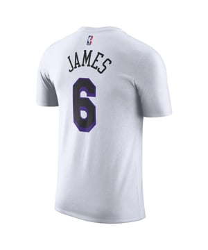 Equip your young Lakers fan with the Nike NBA LA Lakers 6 James LeBron Kids City Edition N&N T-Shirt. Combining iconic team elements with premium comfort, this t-shirt is perfect for showing support for LeBron James on game days, at school, or during casual outings. 
Key Features: 
-Official Player and Team Graphics: 
Features LeBron Jamesâ€™ name and number 6, along with the LA Lakers City Edition logo, providing an authentic and stylish look. 
-Premium Fabric: 
Made from a high-quality cotton blend, this t-shirt offers a soft and comfortable feel that is perfect for all-day wear. 
-Breathable and Lightweight: 
Designed with breathable and lightweight fabric to keep kids cool and comfortable, whether they're playing sports or hanging out with friends. 
-Classic Fit: 
Provides a classic fit that ensures a relaxed and comfortable silhouette, accommodating various body types and activities. 
-Stylish Design: 
The City Edition design incorporates bold Lakers colors and distinct LeBron James graphics, creating a standout piece that highlights team pride. 

Show your childâ€™s support for LeBron James and the LA Lakers with the Nike NBA LA Lakers 6 James LeBron Kids City Edition N&N T-Shirt, a perfect blend of comfort, style, and fan pride. Ideal for game days, sports activities, or everyday wear.