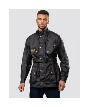 Barbour's iconic motorcycle jacket, the International, was created in 1936 and became the biker jacket of choice through the 50s, 60s and 70s.
Staying true to that heritage, the International Original is constructed in a heavyweight 8oz Sylkoil waxed cotton, offering a stylish matte finish and road-ready protection. Its robust front zip sits beneath a stud-fastening storm fly front, and the funnel collar is lined with corduroy for insulation and a luxurious feel against the skin. The lightweight cotton lining carries the signature Barbour tartan and is studded to take the optional Warm Pile Lining, for added versatility.

Tailored Fit
8oz Sylkoil, 100% Waxed Cotton
Back length: 30.5-31.5ins | 77-80cm
100% Cotton Barbour Tartan lining
Interactive with stud-in liner, multi- pocketed
Sponge clean only
Due to the nature of this wax jacket, the oils within it may transfer onto other materials. we recommend that this jacket is kept away from paler materials, especially in warm conditions
Due to the nature of this wax jacket, the oils within it may transfer onto other materials. We recommend that this jacket is kept away from paler materials, especially in warm conditions
Do not wash