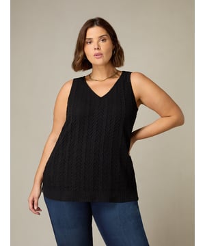 In classic black, this top is cut from a soft stretch crochet thats so comfortable to wear. With a lengthening V-neck, it has a flattering A-line shape with side splits at the hem for extra room and movement, making it the perfect piece to dress up or down.
