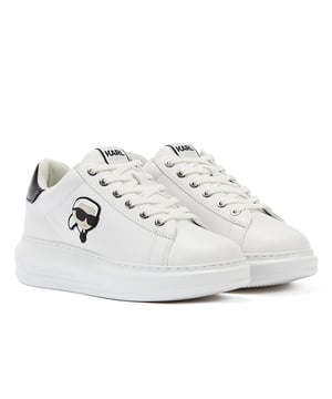Elevate your casual style with these leather trainers featuring iconic Karl Lagerfeld K/Ikonik artwork on the side. The KARL logo on the contrasting heel counter adds a touch of sophistication. Step confidently on the durable rubber sole, showcasing a perfect blend of fashion and comfort.