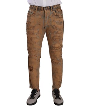 Jeans de denim desgastados 100% auténticos de Dolce & Gabbana  
Confeccionados en algodón  
Cierre de cremallera y botón  
Estilo: Jeans pantalón de denim  
Color: Marrón  
Ajuste: Corte regular  
Detalles de logo  
Hecho en Italia  
Material: 100% algodón