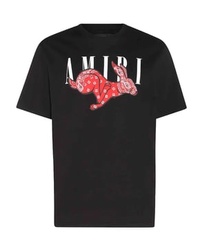 This refined white Amiri "CNY Rabbit Logo T-Shirt" brings together modernity and age-old Chinese tradition. The T-shirt features the symbolic rabbit, a Chinese zodiac sign that signifies luck, grace, and prosperity. Make a timeless statement of culture and design.