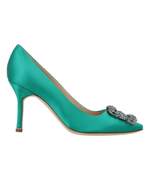 Satin almond toe pumps featuring a square crystal buckle encased in a gunmetal frame. Finished with a stiletto mid heel.

Upper: 68% viscose, 32% silk.
Sole: 100% cow leather.
Lining: 100% kid leather.
Heel measures 90 mm.
Made in Italy.