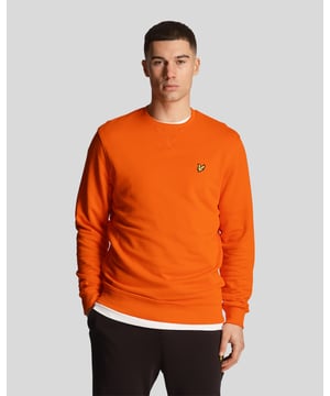 Das Lyle & Scott Sweatshirt mit Rundhalsausschnitt eignet sich perfekt zum Kombinieren mit Jeans, der passenden Jogginghose oder Shorts. Es besteht aus 100 % BCI-Baumwolle und ist auf Langlebigkeit ausgelegt. – Tangerine Tango – 100 % BCI-Baumwolle – Gerippte Bündchen, Kragen und Saum – Eingesetzt Ärmel – 320 g/m² Loopback-Stoff