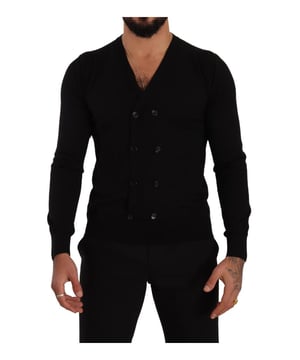 100% Authentic Dolce & Gabbana cashmere cardigan sweater
  Brand new with tags
  Button applique
  Straight cut
  Thick ribbed knit at the cuffs v-neckline and waistband
  Made in Italy
  Material: 100% Cashmere