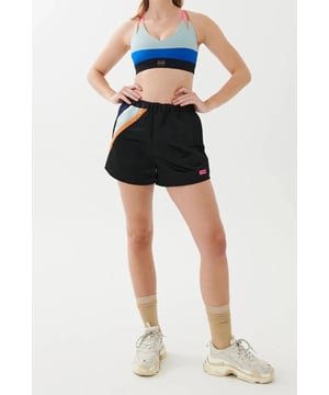 A mid-rise relaxed fit boxing-style short.  soft elasticated waistband features internal P.E Nation shoelace drawcord to fit as needed. Two side pockets and one back pocket make it a relaxed style