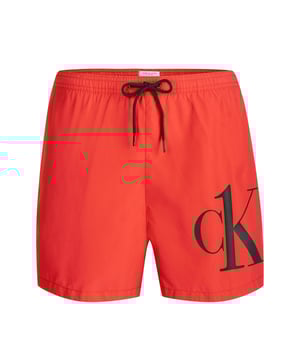 100% poliéster reciclado; Bañadores de Calvin Klein Trajes de baño; Modelo: KM0KM00591XND; Mano de obra de alta calidad; 100% poliéster reciclado; ajuste regular; Cintura elástica con cordón; Dos bolsillos laterales, un bolsillo trasero con cierre de velcro; Calzoncillos integrados; Detalles del logotipo de Calvin Klein Trajes de baño
