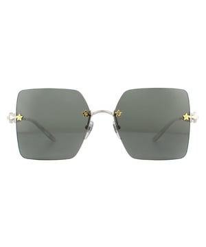 Gucci Sunglasses GG0644S 001 Silver Greyare incredibly glamorous with the large rimless square lenses set into the frame with star details screws. Leage crystal feature down the temples alongside the GG logo to great effect..