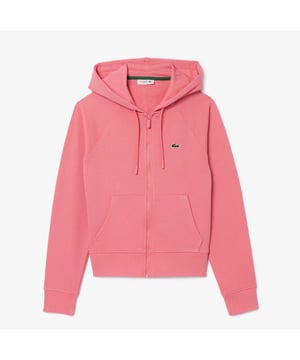 Damescapuchon met rits van Lacoste Fleece. Deze hoodie met rits is onmisbaar in dameskleding van Lacoste, bedenkers van sportkleding sinds 1933. Gemaakt van een comfortabele katoenen fleece stof met een tijdloos, minimalistisch ontwerp, afgewerkt met onze iconische geborduurde krokodil. Het ultieme in casual chic. Dit artikel valt klein. Wij adviseren u een maat groter te nemen dan uw gebruikelijke maat.- Verstelbare capuchon met elastisch trekkoord.- Ritssluiting.- Geribbelde afwerking.- Geborduurde krokodil op borst.- Organisch ongeborsteld katoenfleece.- Hoofdstof: 83% Katoen, 17% Polyester. Voering capuchon: 100% Katoen. Rib: 98% Katoen, 2% Elastaan. Machinewasbaar. Ref: SF9213PQU.