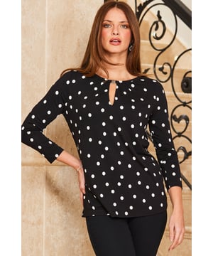 REASONS TO BUY:

It's a polka dot kinda day
Comfy body-skimming fit
Scoop neck with chic clasp detail
Monochrome spots - always in style
It's work and weekend friendly
Add your go-to jeans or luxe it up with leather trousers