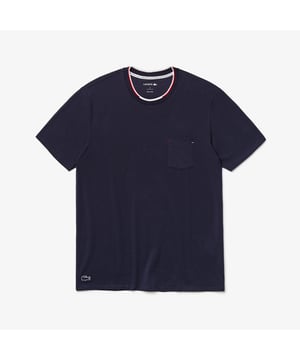The essential loungewear of Lacoste wardrobe. The French Flag crew neck pyjamas t-shirt  from our Iconic pyjamas silhouette. A tee highlighted by tricolor stripes in the neckline  a tonal embroidered croc on the right bottom and a pocket on his chest. Made with a soft stretch cotton for more comfort. Pyjamas tee shirt Relaxed fit: comfortable ease on body with lower shoulders Stretch cotton fabric Short sleeve  ribbed colar with coloured stripes Patched pocket with coloured bartacks on chest 3cm tonal croc with white outline on body bottom 
