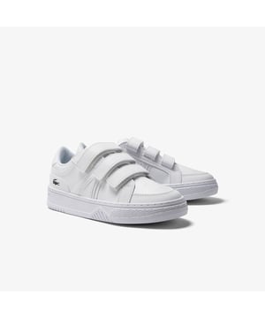 • Triangular design on the upper to honour a vintage racket from the 80s • Faux leather uppers • Stap fastening for an easy fit • Embossed printed crocodile on heel counter • Rubber outsole.