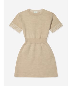 Fendi embody passion and Italian elegance in their beautiful aesthetics. This girls knitted logo reversible dress is both captivating and totally versatile. Crafted in refined material, one side features hypnotic FF patterning whilst the other side is in a statement beige shade. Featuring a cinched ribbed waist and trims, she will look and feel divine. 85% Wool 14% Polyamide  1% Polyurethane